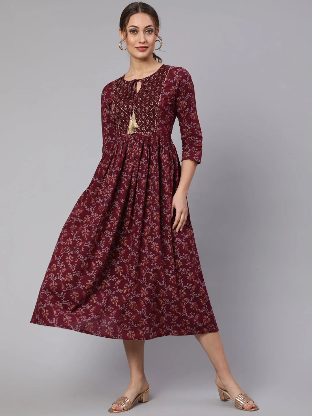 Wome Burgundy Printed Flared Dress With Three Quarter Sleeves