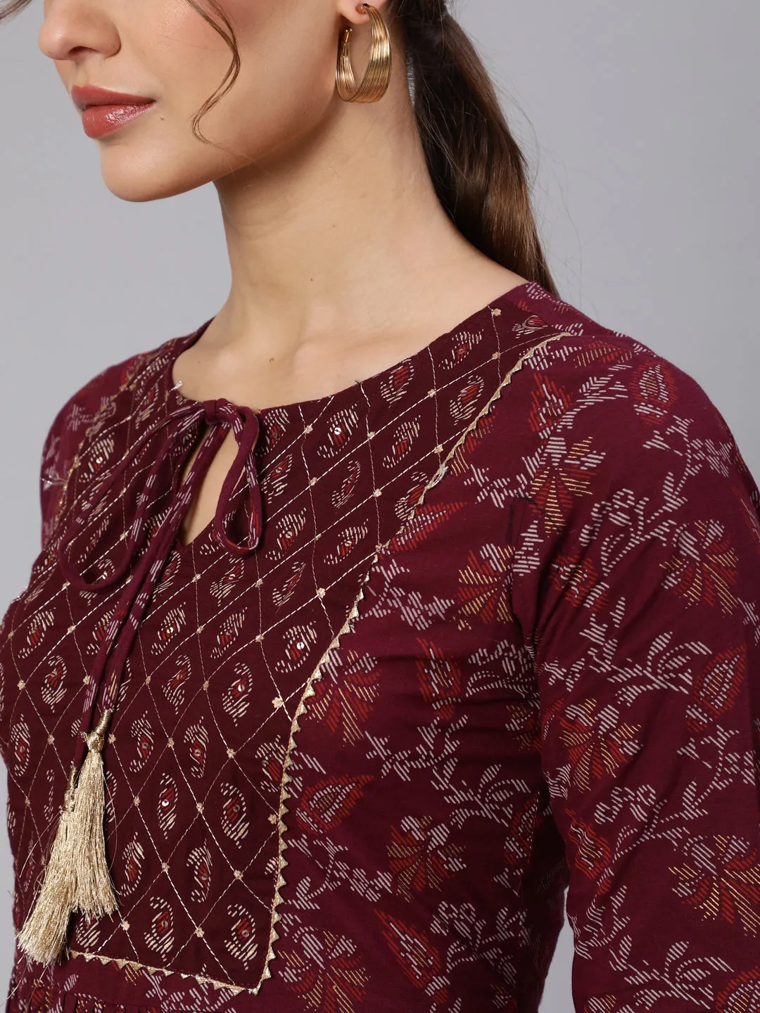 Wome Burgundy Printed Flared Dress With Three Quarter Sleeves