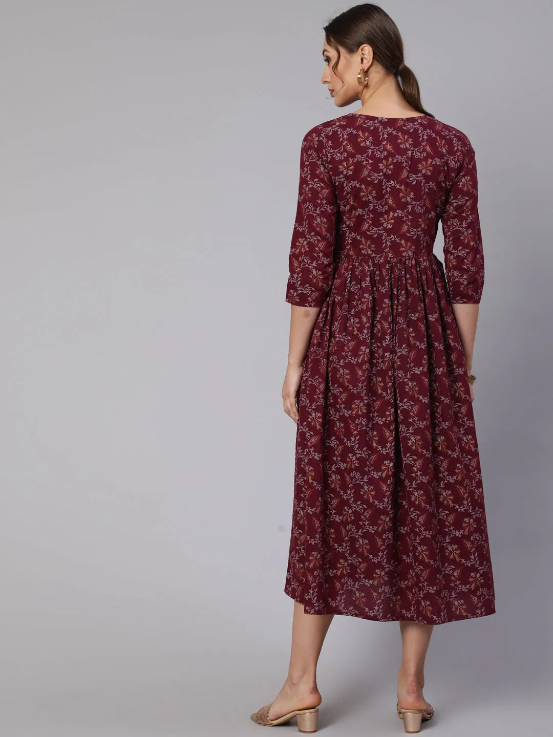 Wome Burgundy Printed Flared Dress With Three Quarter Sleeves